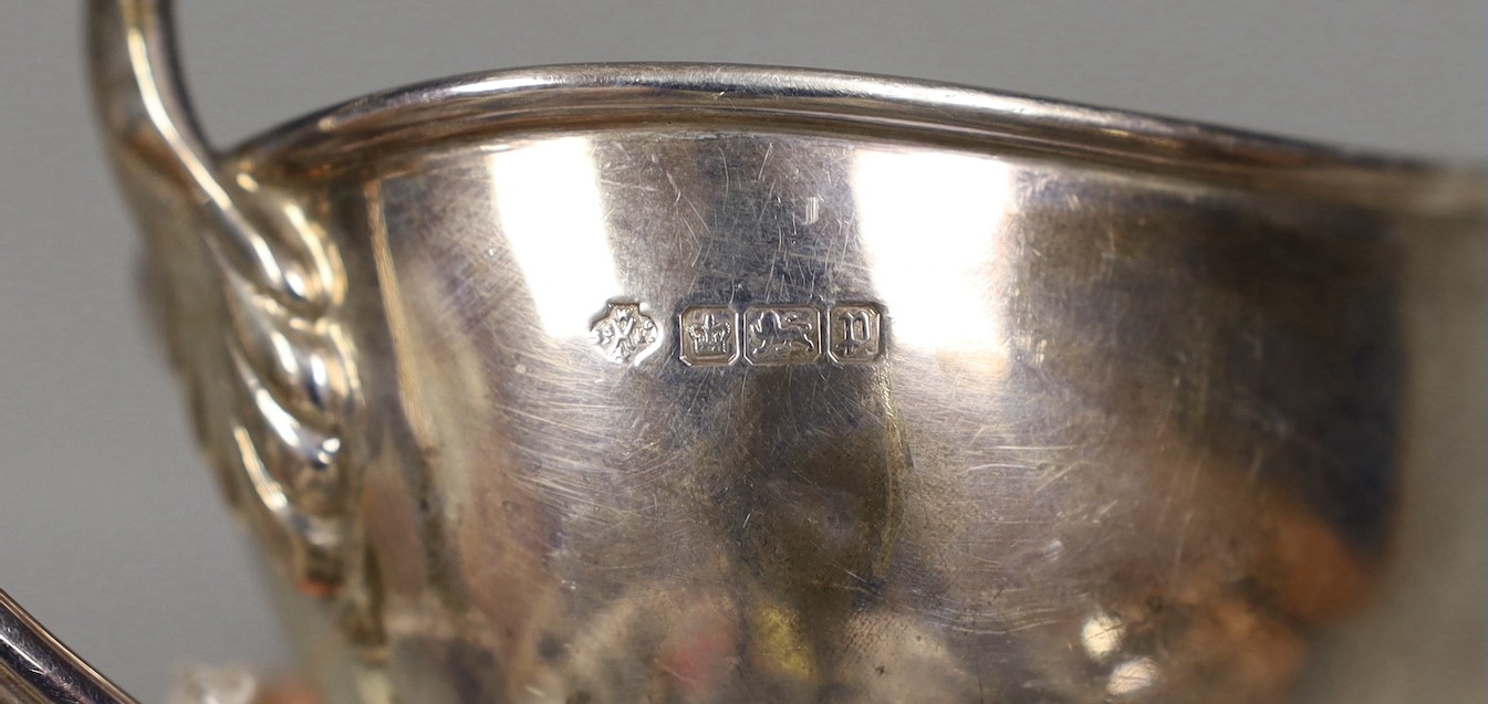 A pair of George V silver pedestal sauceboats, William Hutton & Sons, Sheffield, 1916, 11.4oz.